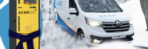 Kerr AIRCENTER Compressor with a hat & scarf plus a Kerr Service Van in snowy winter conditions